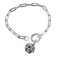 Sterling silver paperclip style chain with a circular clasp and a texture high shine disc charm hanging from the clasp.