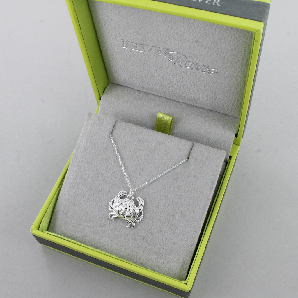 Sterling Silver Crab Necklace on a silver adjustable chain. Shown in a Reeves & Reeves grey and green branded gift box.