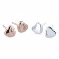 Two pairs of heart studs, 3dimensional in style on stud style posts with a high shine finish.