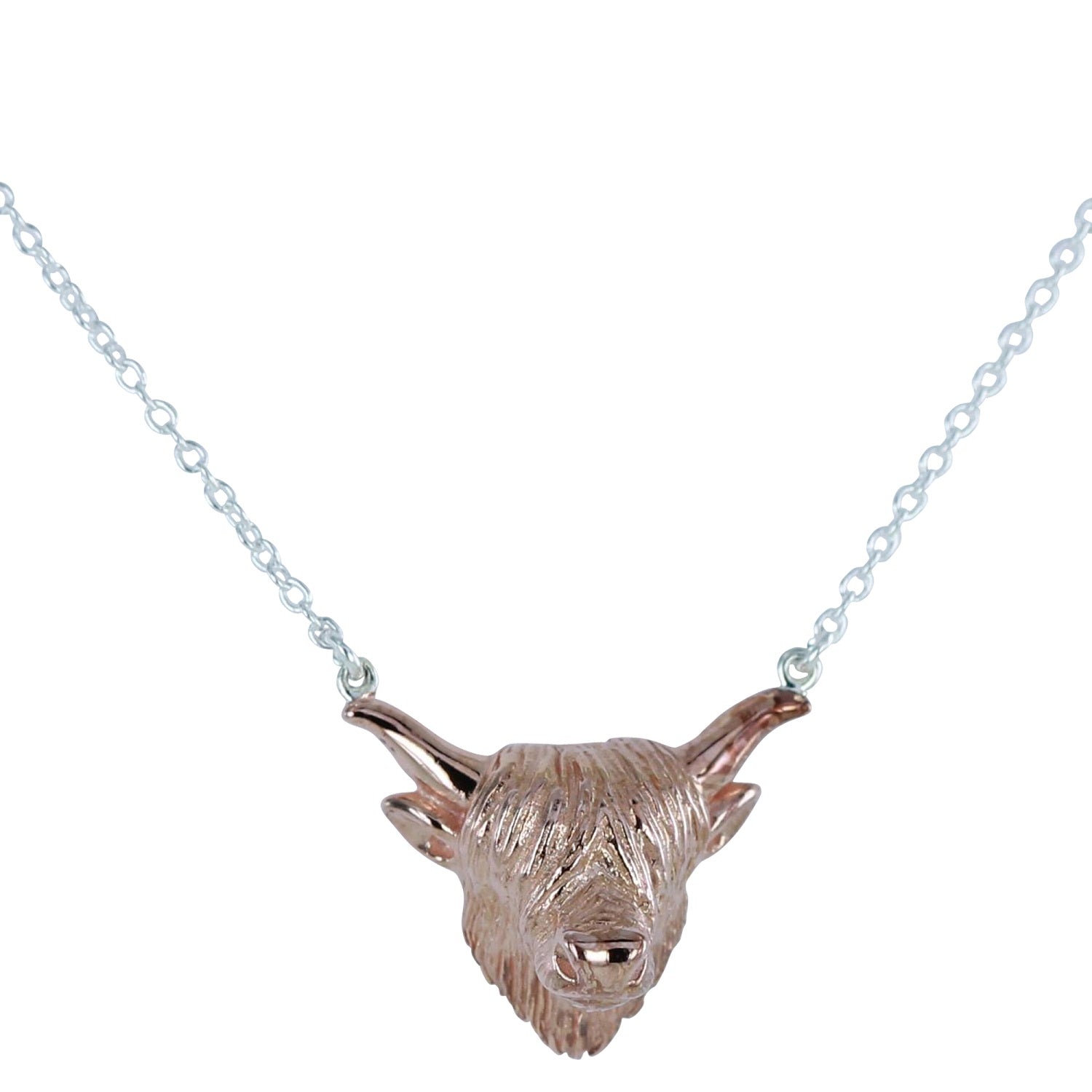 A rose gold plated Highland Cow Head Necklace, hanging on a sterling silver adjustable chain. Nature inspired gift for her.