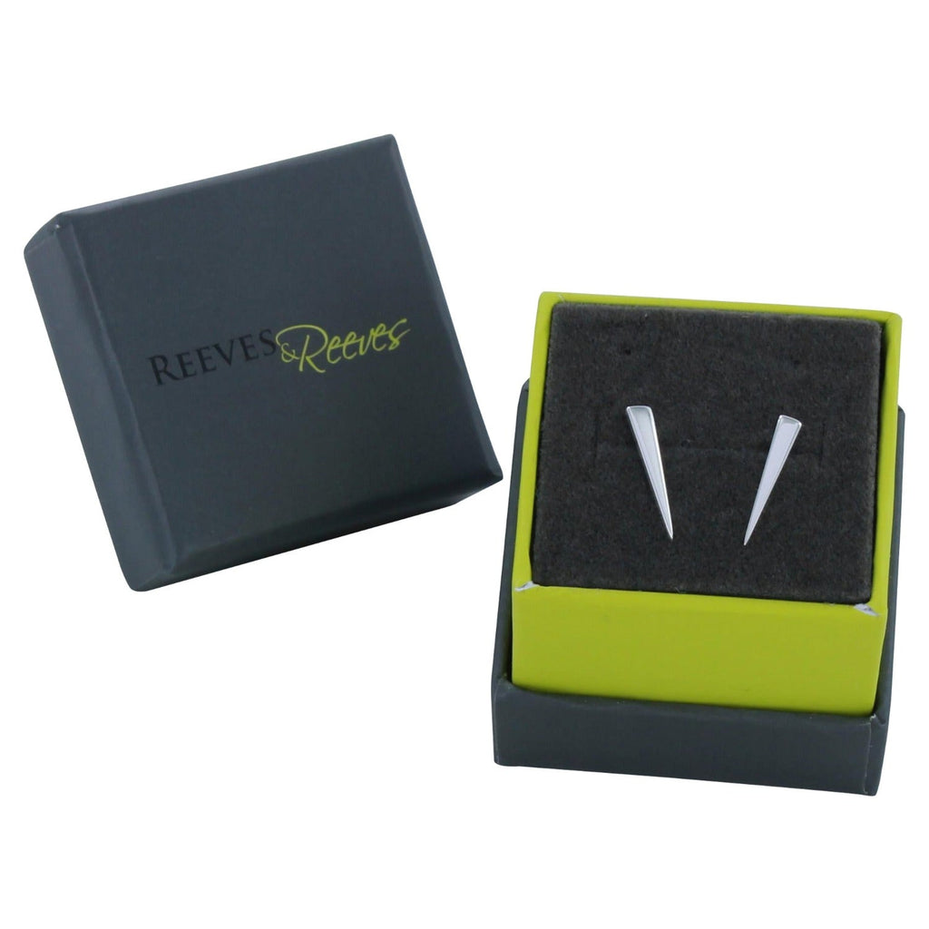 A pair of sterling silver iso triangle stud earrings, shown in a Reeves & Reeves gift box.