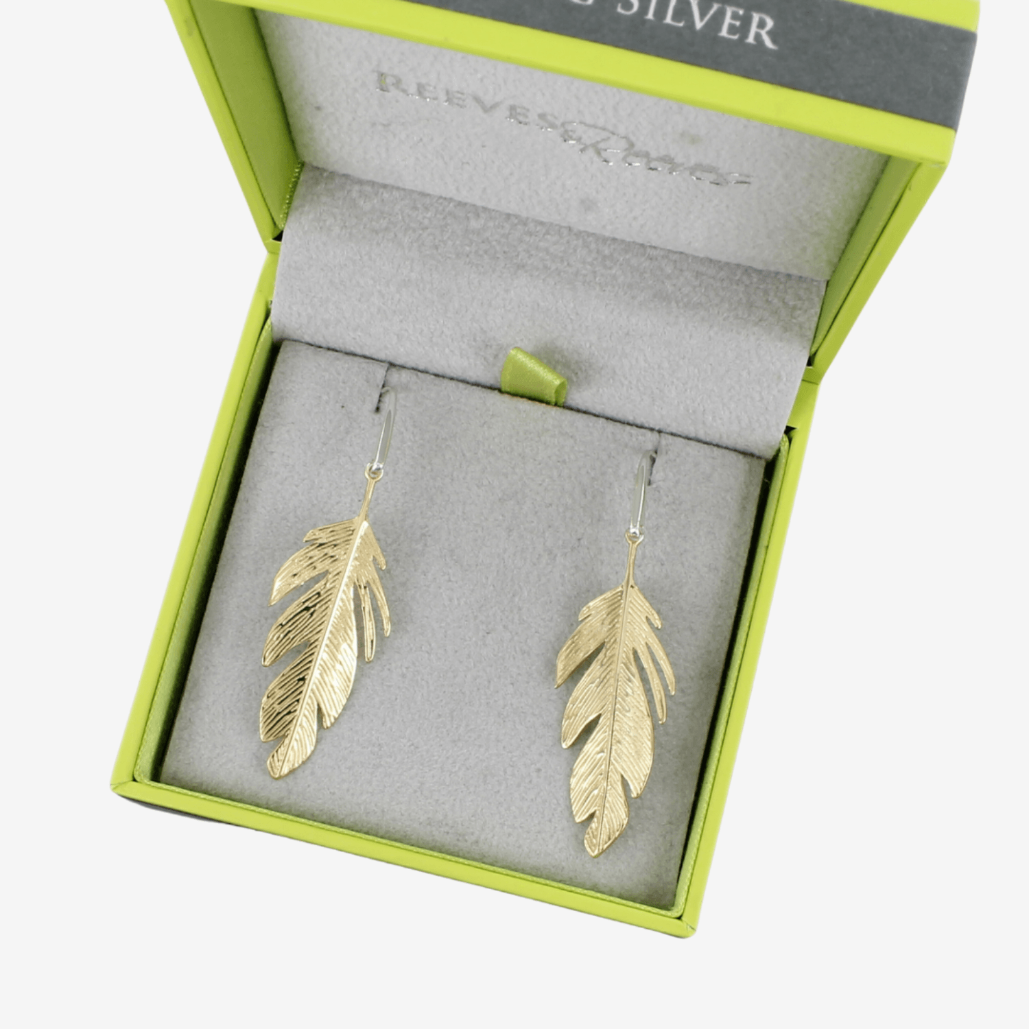 A pair of sterling silver large feather drop earrings with 18ct gold plate, shown in a Reeves & Reeves gift box.