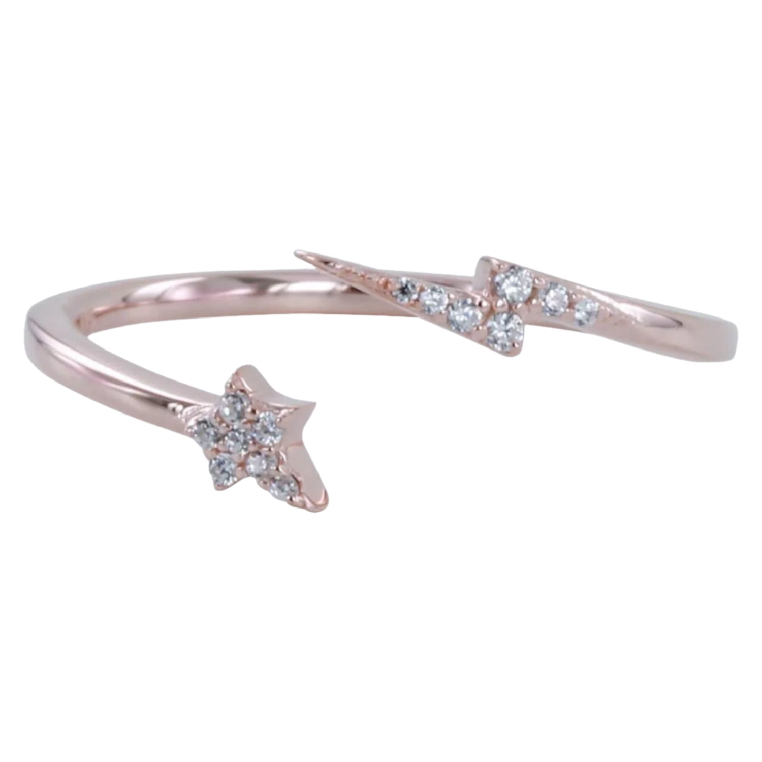 Rose gold adjustable banded ring with a star at one end and a lightening bolt at the other, filled with cubic zirconia stones.
