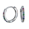 A pair of sterling silver sleeper earrings with multi-colored cubic zirconia stones on the front.