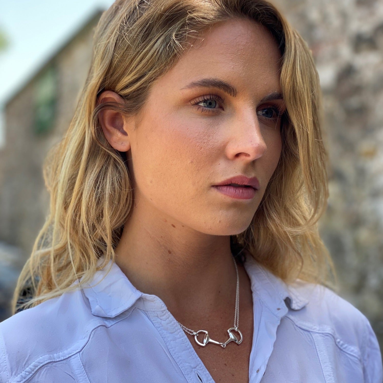 Sterling Silver Snaffle Feature Necklace on a double style chain and worn on a model.  