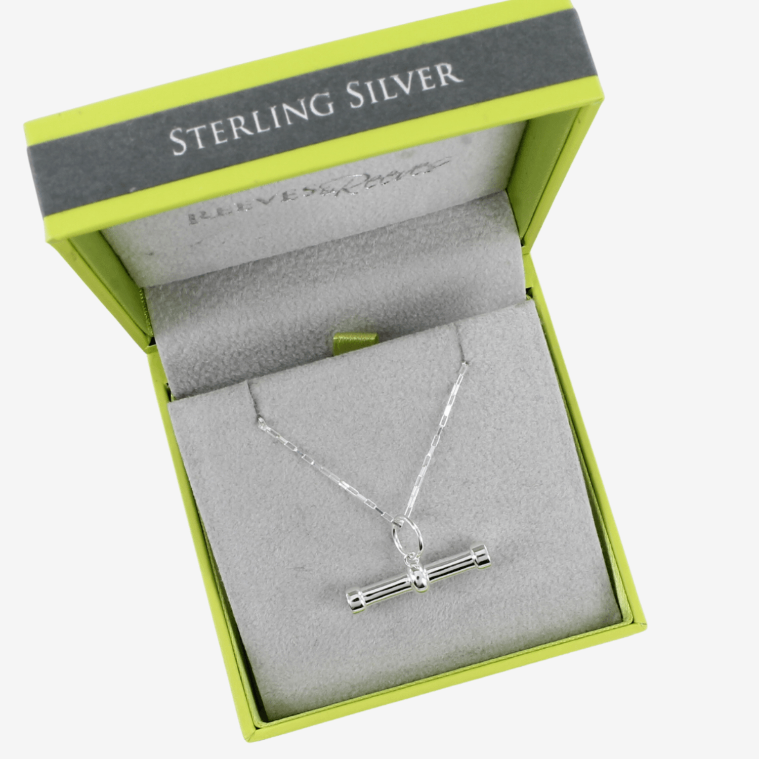 A Sterling Silver T Bar Necklace, hung on a silver box chain and shown in a Reeves & Reeves grey and green branded gift box.
