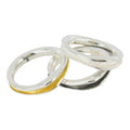 Three silver rings, each with a concave design, and a choice of silver, gold plated or black rhuthenium.