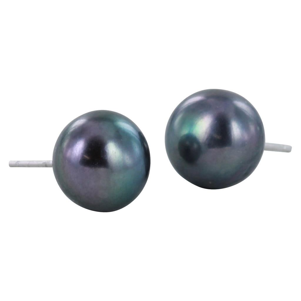 A pair of peacock coloured pearl stud earrings.